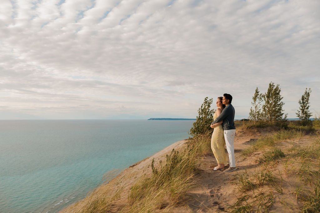 Couple admiring Lake Michigan from Pierce Stocking Scenic Drive