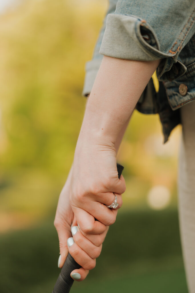 engagement ring feature while golfing with her fiance