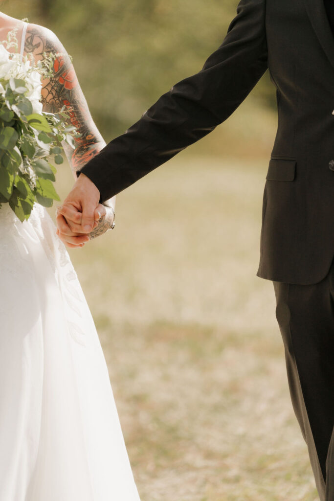 recently married couple walking back down the aisle after saying their vows