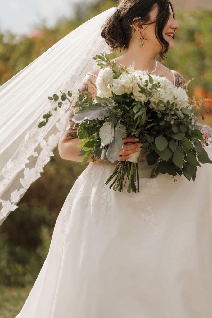 close up of a bridal bouquet at a wedding ceremony in MI