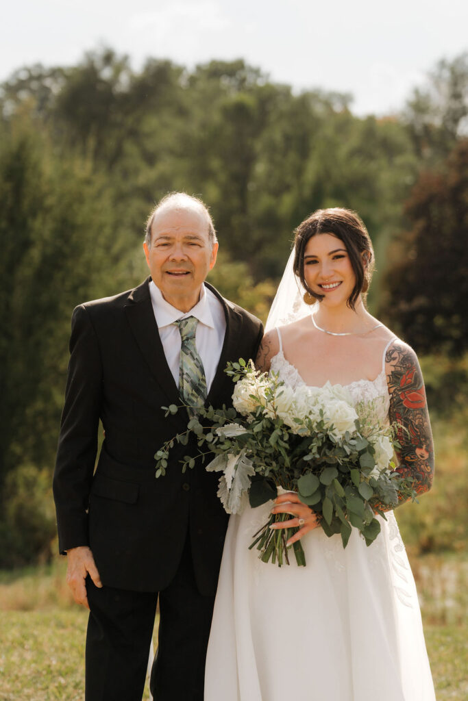 father figure of the bride and bride family photos at the wedding