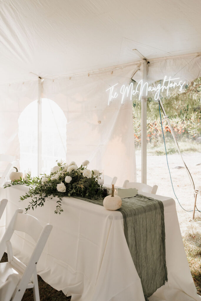 green tablecloth across the table at local michigan wedding