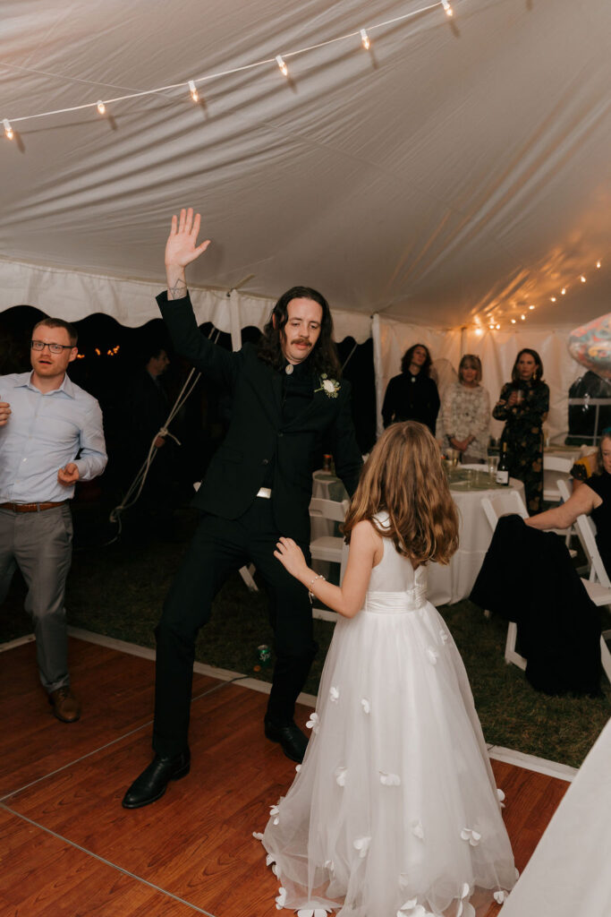 family dance party at the intimate wedding of a couple in brooklyn mi