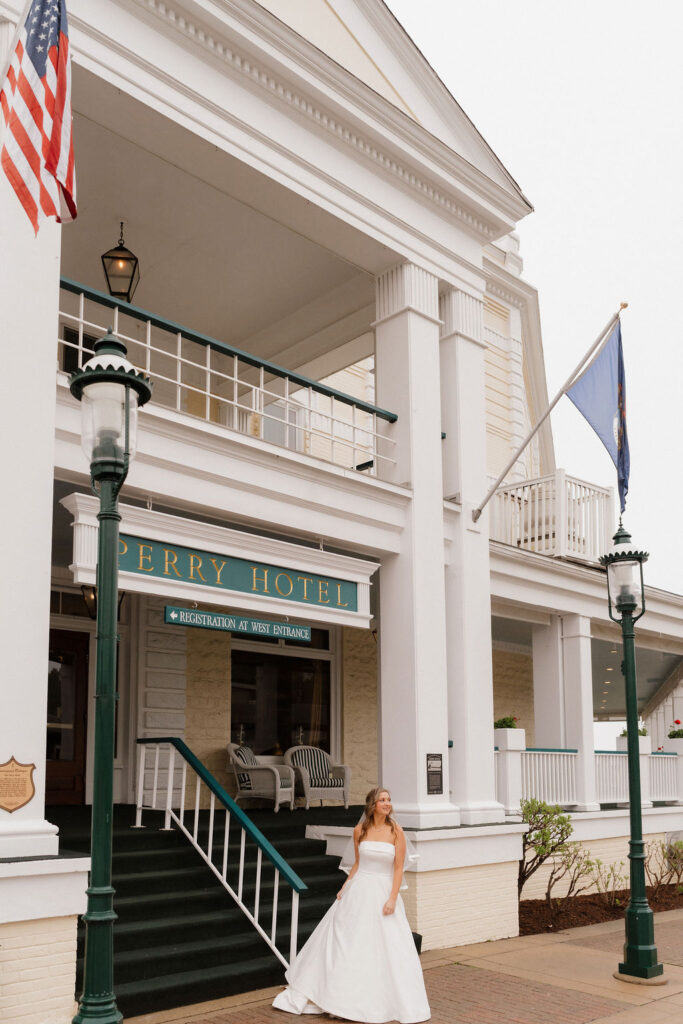 bride standing outside the perry hotel 